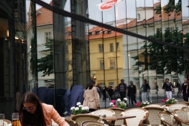 Cafe and reflections in window, Prague